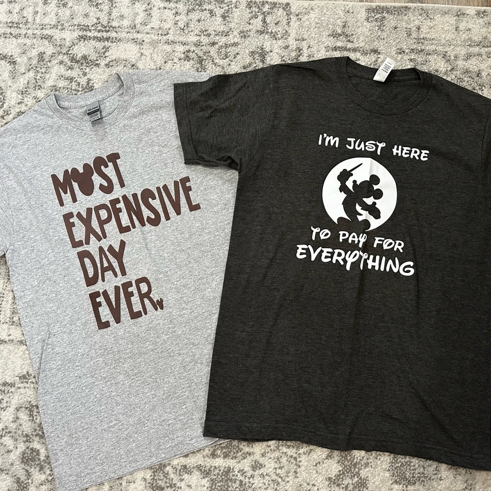 2 Disney dad shirts size medium.